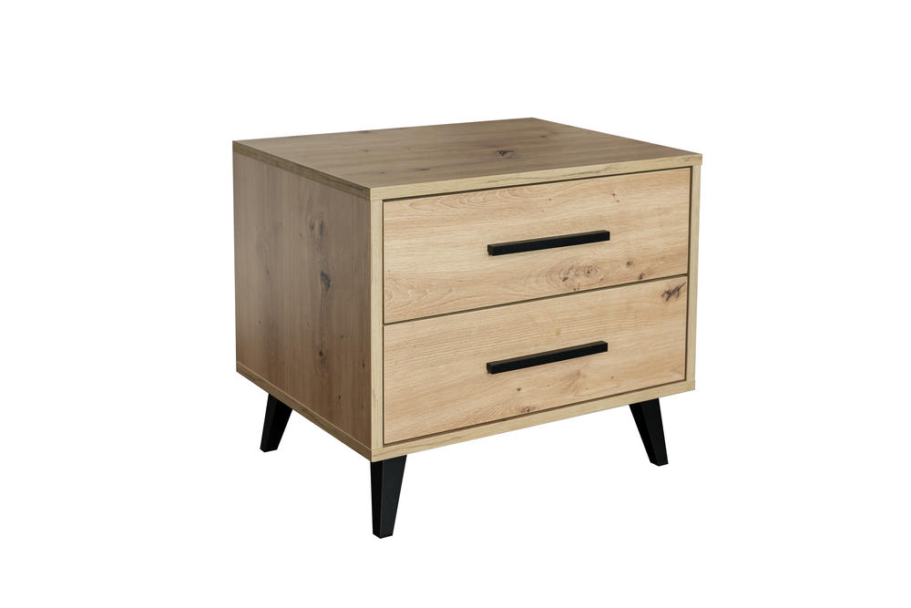Naktinis staliukas Kos Artisan ąžuolo spalvos ant aukštų kojelių šalia lovos